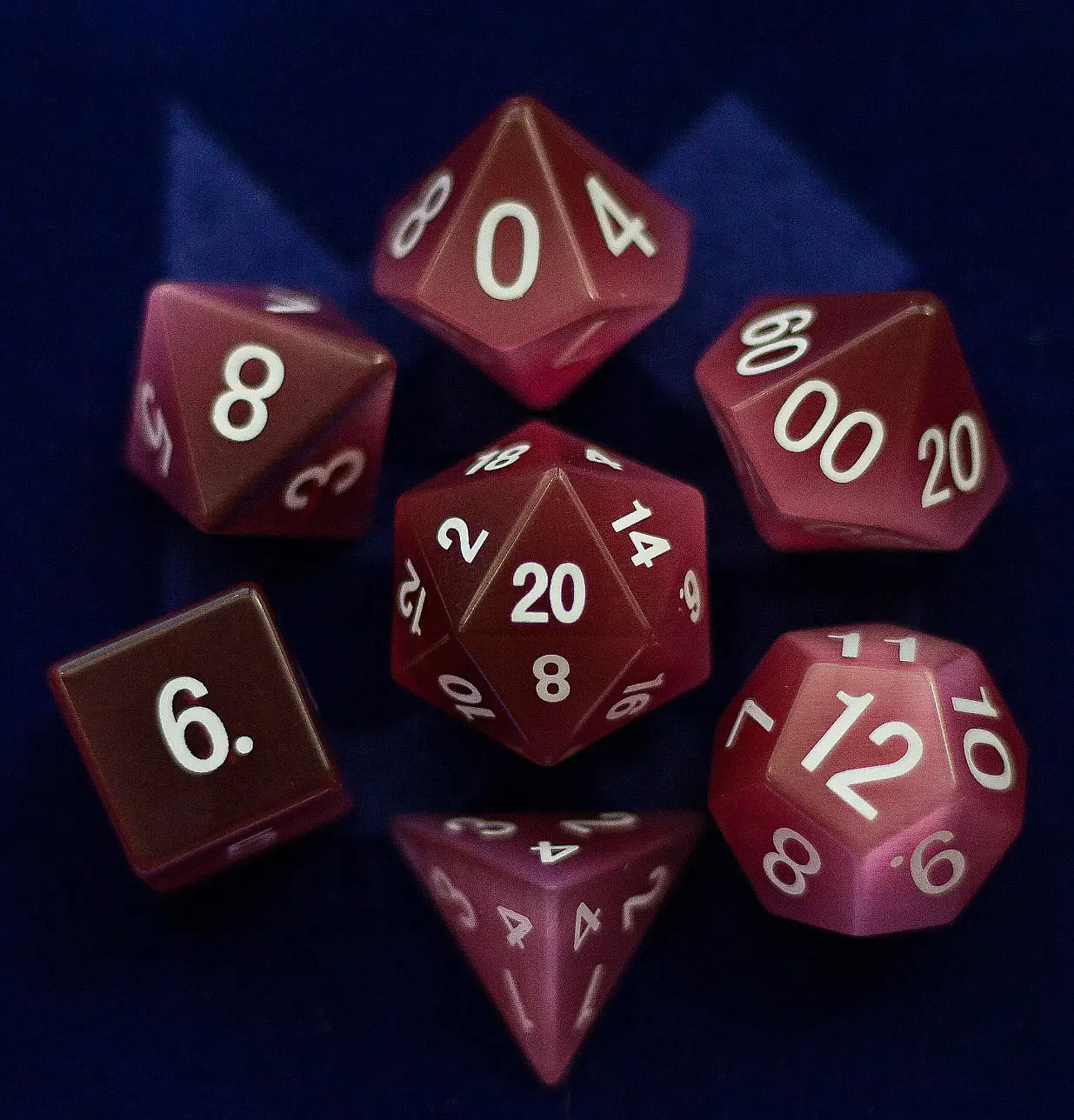 MDG 16mm Stone: Catseye Pink Stone Poly 7 Dice Set | Odin's Place