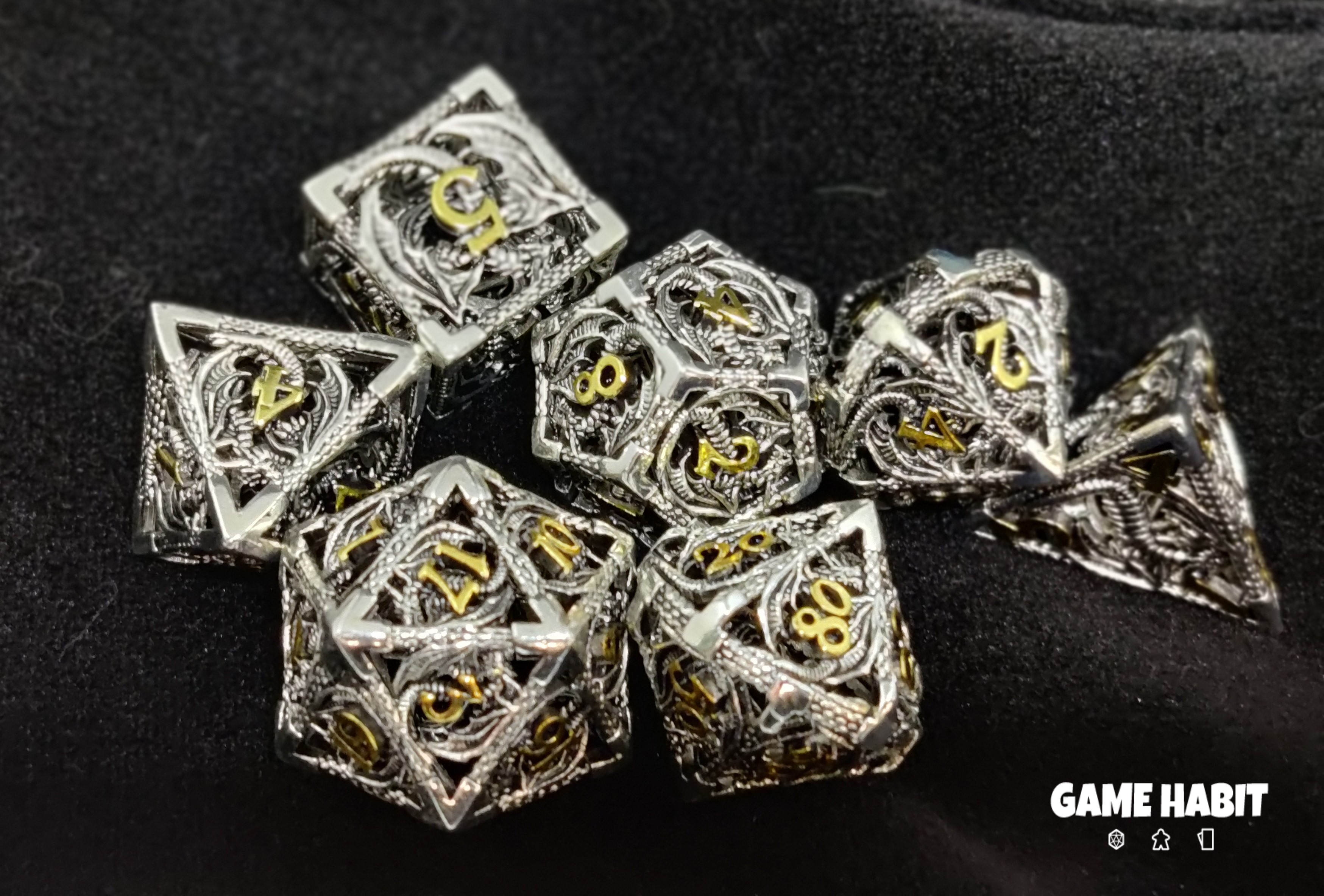 Game Habit Sterling Braids Hollow Metal Dragon Poly 7 Dice Set | Odin's Place