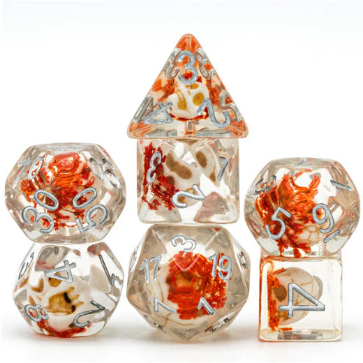 Foam Brain Orange Flower with White Skull Poly 7 Dice Set | Odin's Place